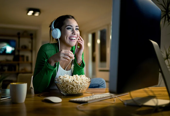 a woman enjoying IPTV online